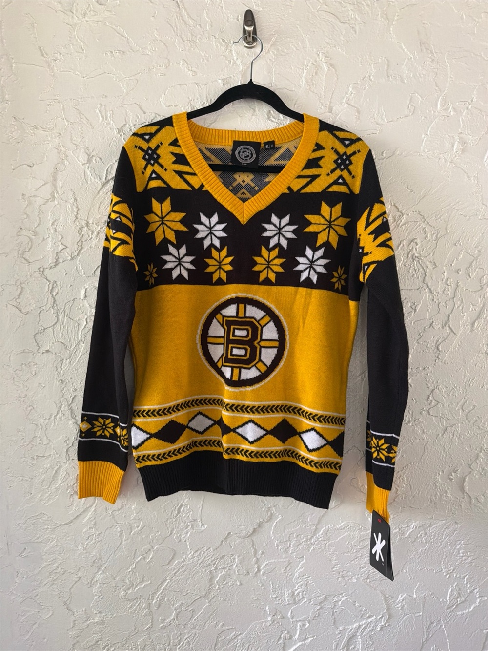 NHL Black & Gold V-Neck Sweater with Team Crest